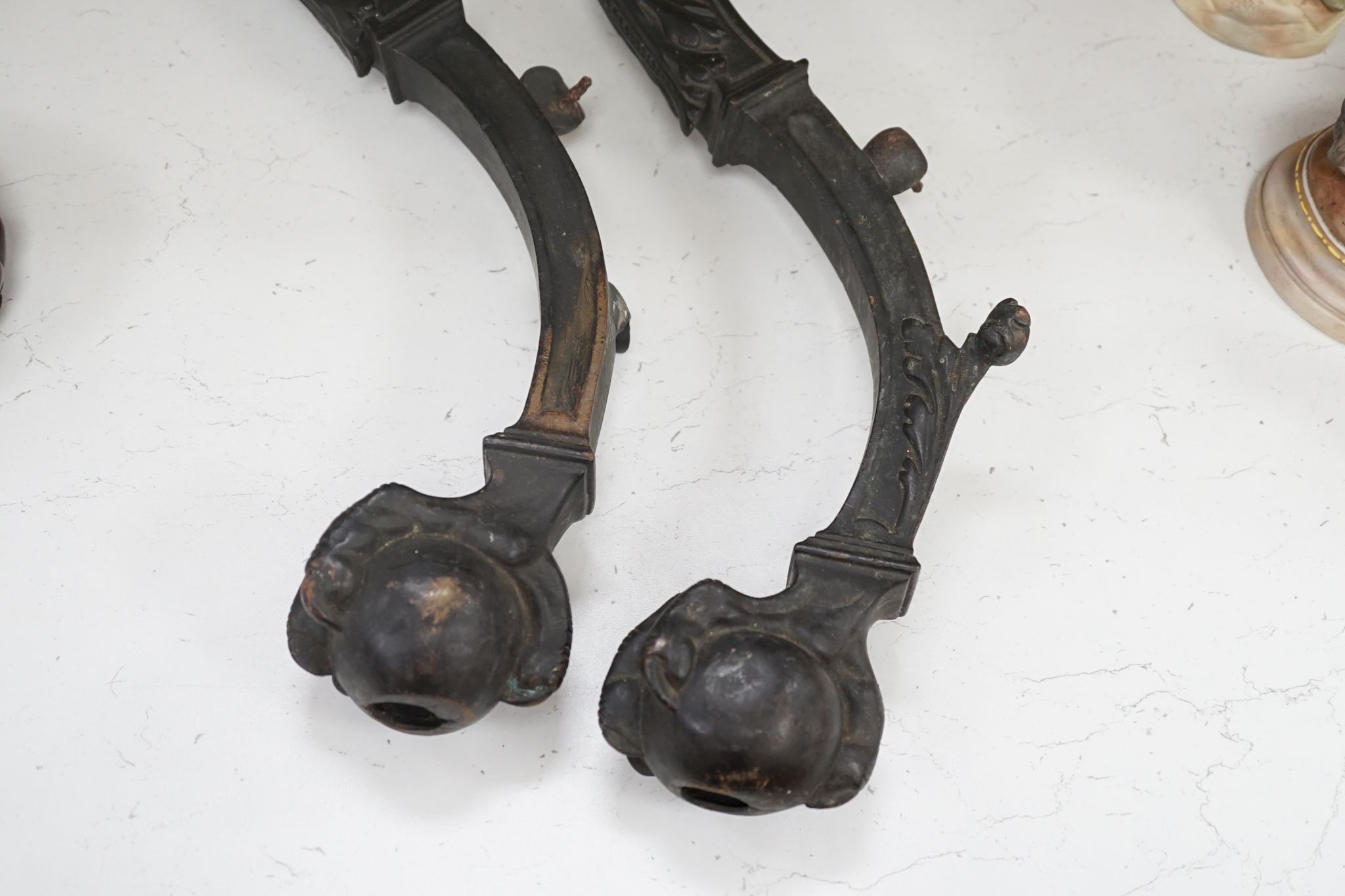 A pair of 19th century bronze griffin furniture mounts 62cm